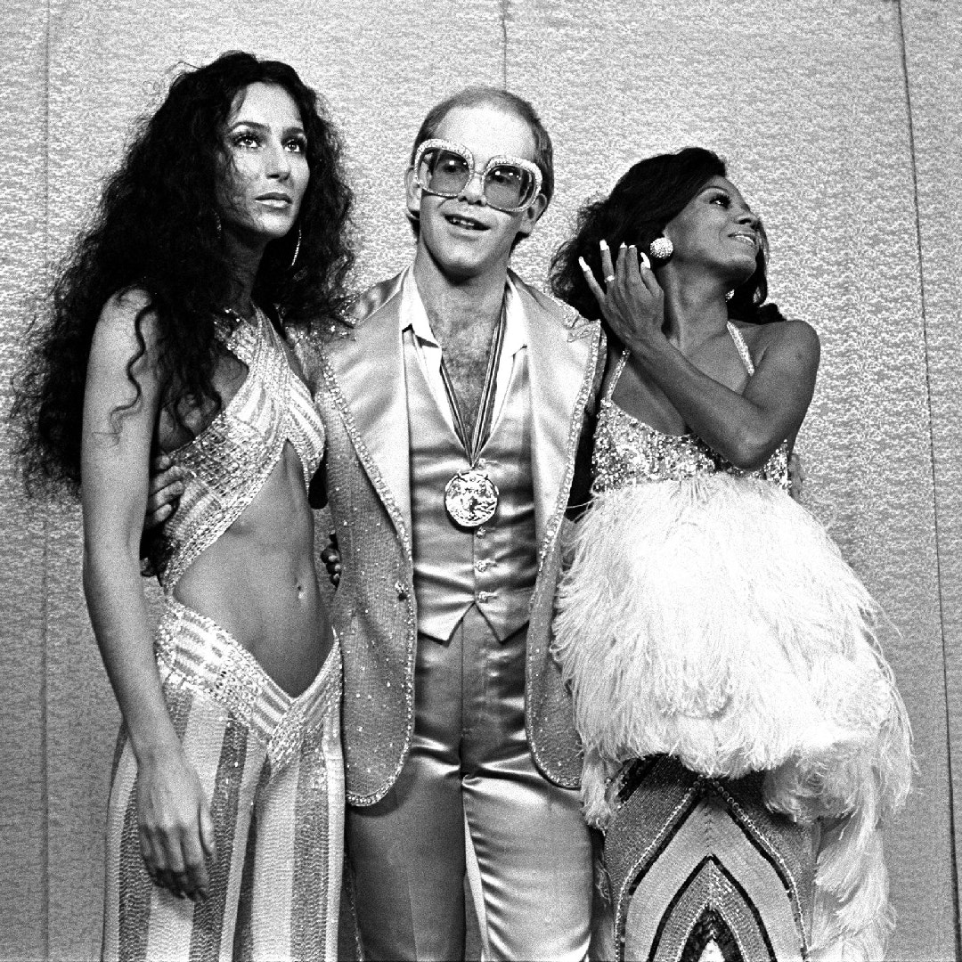 Cher-Elton-John-and-Diana-Ross-at-Rock-Awards-Santa-Monica-Civic-Auditorium-1975-Photo-Mark-SullivanContour-by-Getty-Images-16-9.jpg
