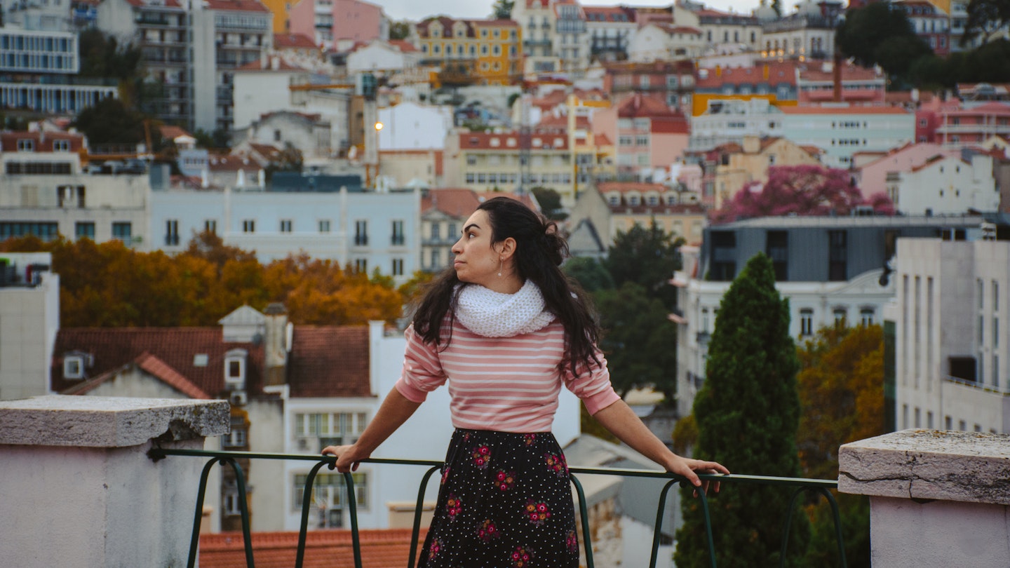Woman looking aside at Jardim do Torel viewpoint in Lisbon with views of the city as backdrop Portugal
1372228779