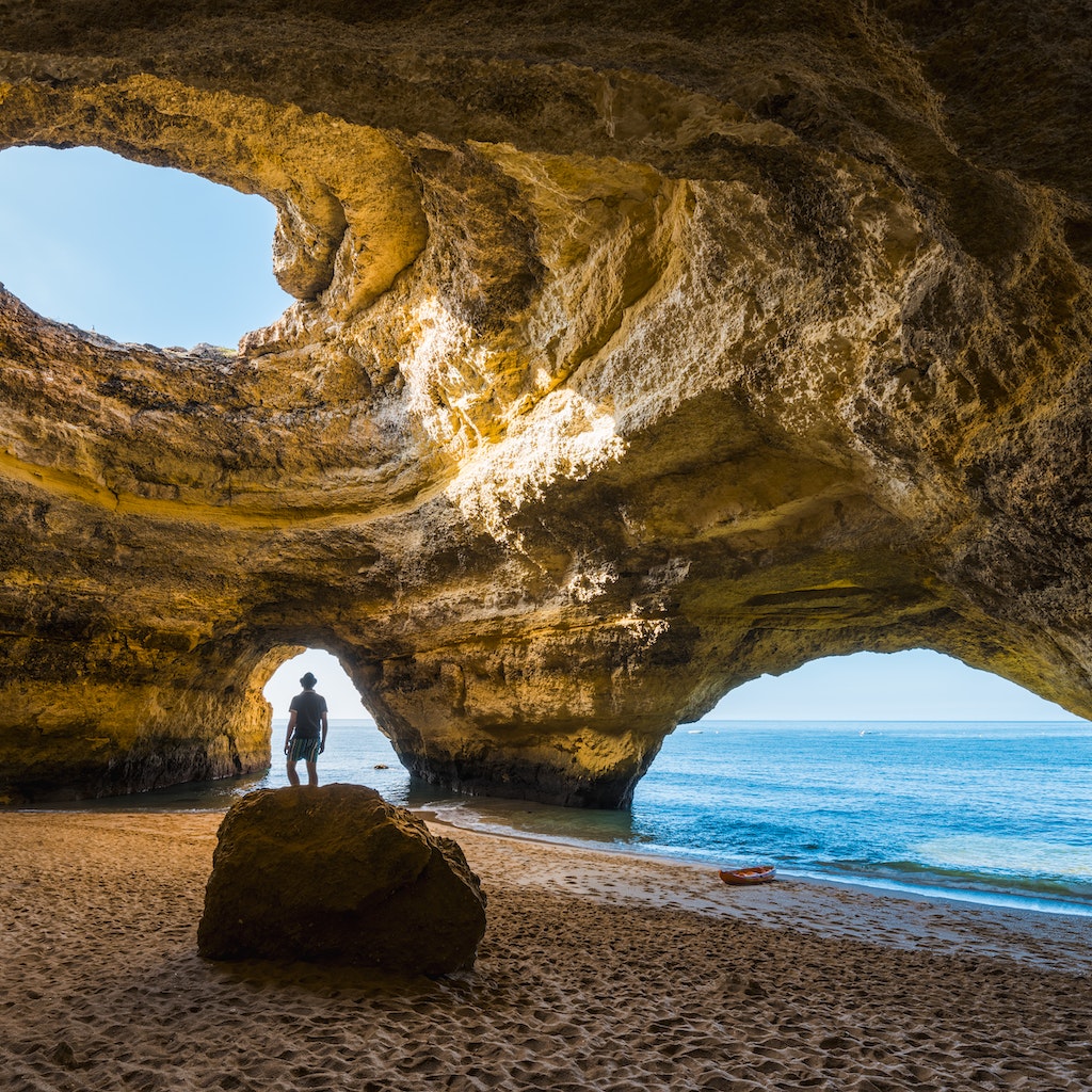 Solitary man inside the Benagil caves, Portugal